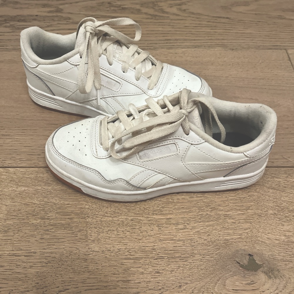 Women’s white Reebok Sneakers.